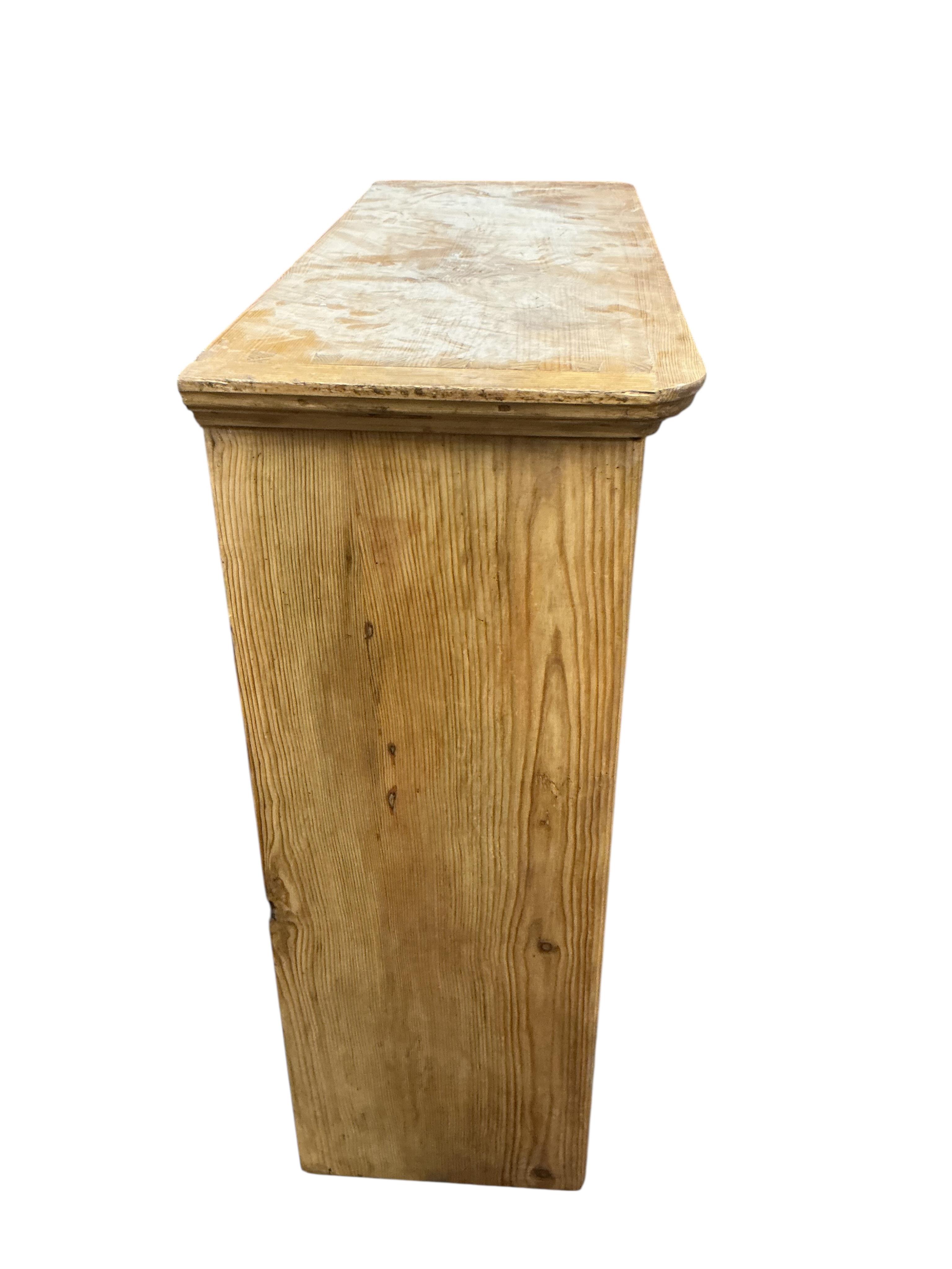 A Victorian pine two door cabinet, width 95cm, depth 37cm, height 97cm